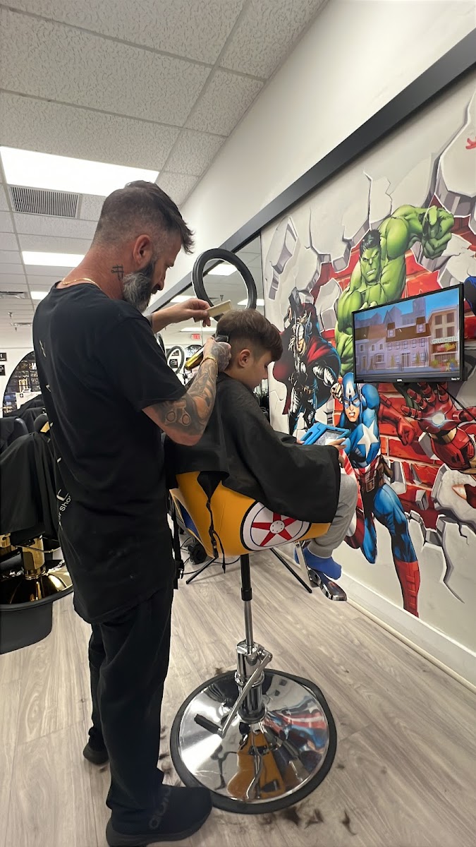 Kid in the superhero corner